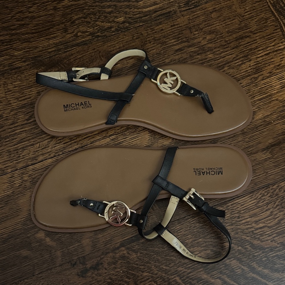 Michael Kors Black Leather T-Strap Sandals with Gold MK Emblem